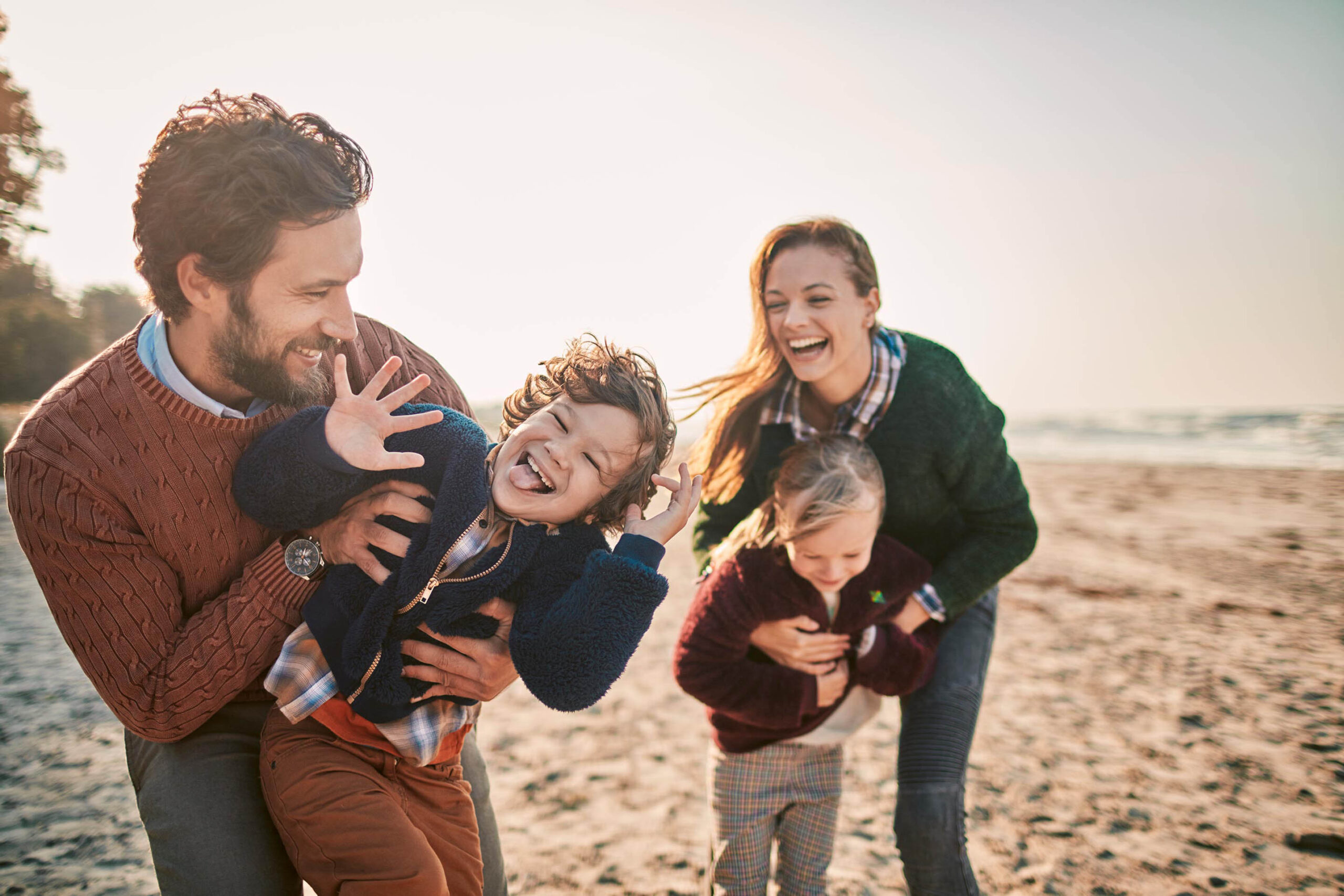 family on beach-rev